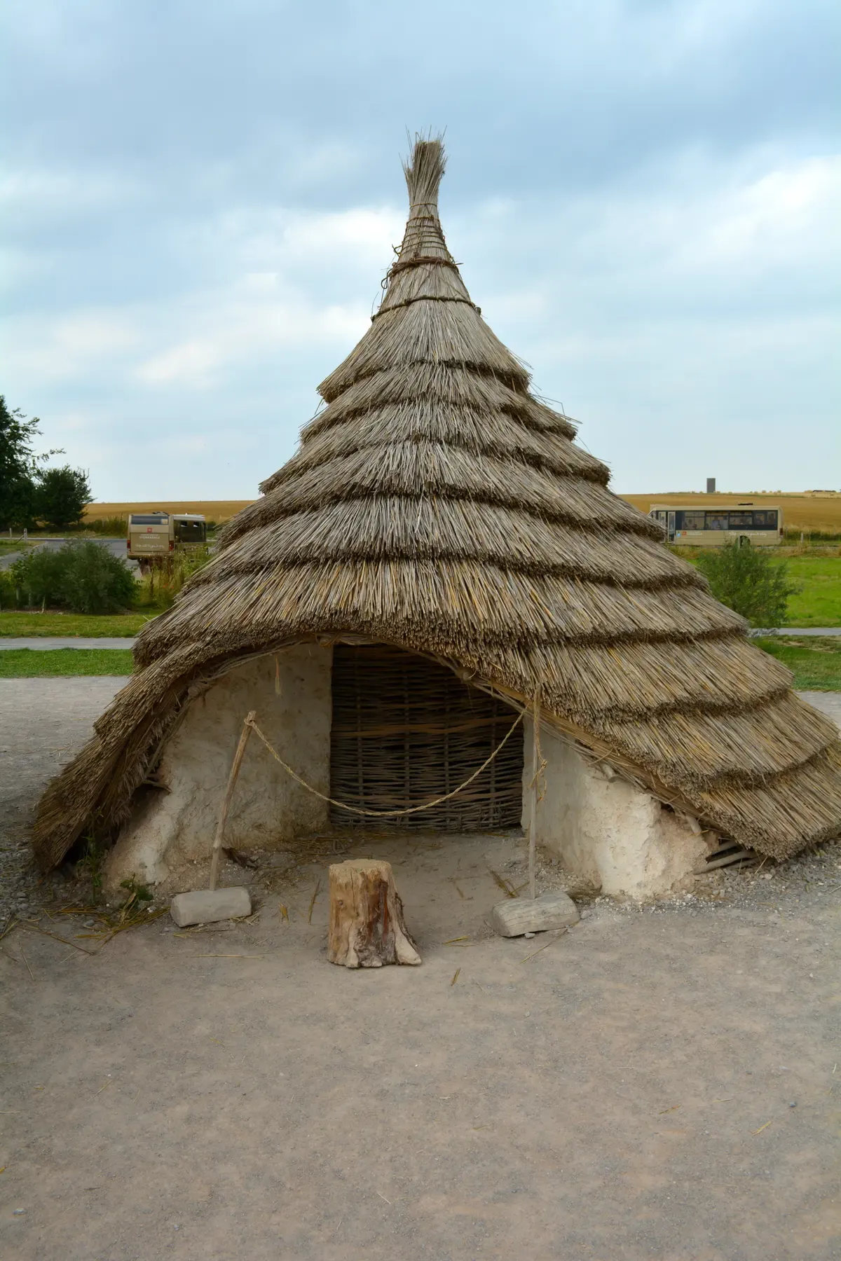 A reconstructed Neolithic house at the Stonehenge visitor centre, included on Stonehenge tours from London, Wiltshire